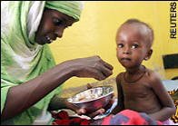 Kenyan mother feeds her child